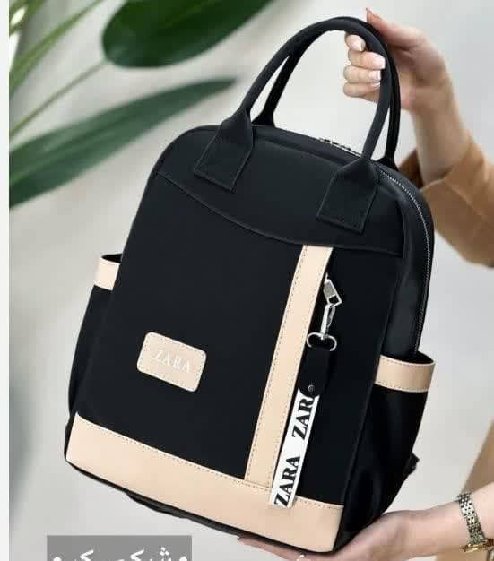 نام:  ** 🎒 کوله زارا **  🦋 جنس: نانسی درجه یککک 📏 📏 یک کوله‌ی شیک، جادار و فوق‌العاده باکیفیت که برای هر موقعیتی عالیه! 😍  🦋· جنس نانسی خارجی با کیفیت بالا 🦋· آستر خارجی تمیز و بادوام 🦋· بندهای محکم و قابل تنظیم برای حمل راحت 🦋. مناسب دانشگاه ،مدرسه و محیط کار ✅· ابعاد: ۳۶ × ۲۸ × ۱۲ سانتیمت  #کوله_زارا #کوله_جادار #کوله_زنانه #کیف_کوله_شیک #مد_دانشجویی 🖌 رنگ بندی: مشکی کرم